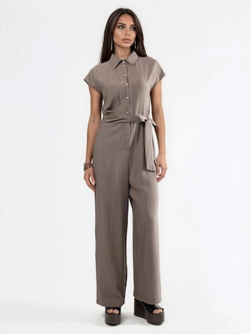Busem Jumpsuit in Brown: front