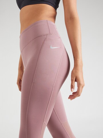 NIKESkinny Sportske hlače 'Epic Fast' - roza boja