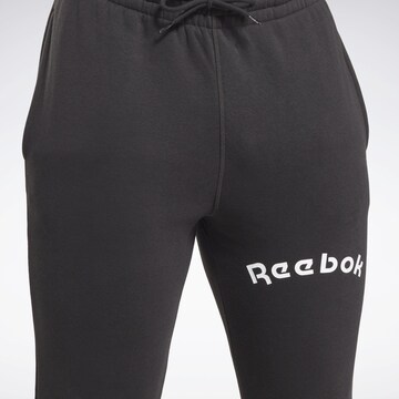 Reebok - Tapered Calças de desporto em preto