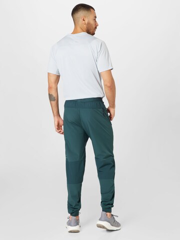 Superdry Zwężany krój Spodnie sportowe w kolorze zielony