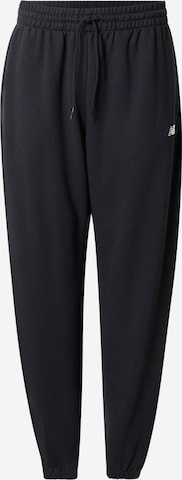 Effilé Pantalon new balance en noir : devant