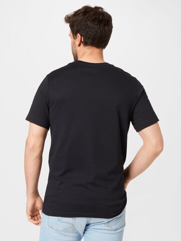 NIKE Sportshirt 'Clash' in Schwarz