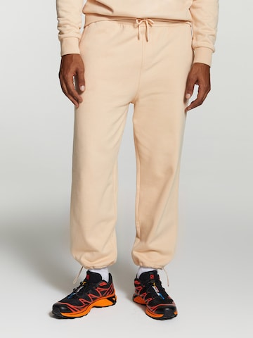 Shiwi Tapered Pants in Orange: front
