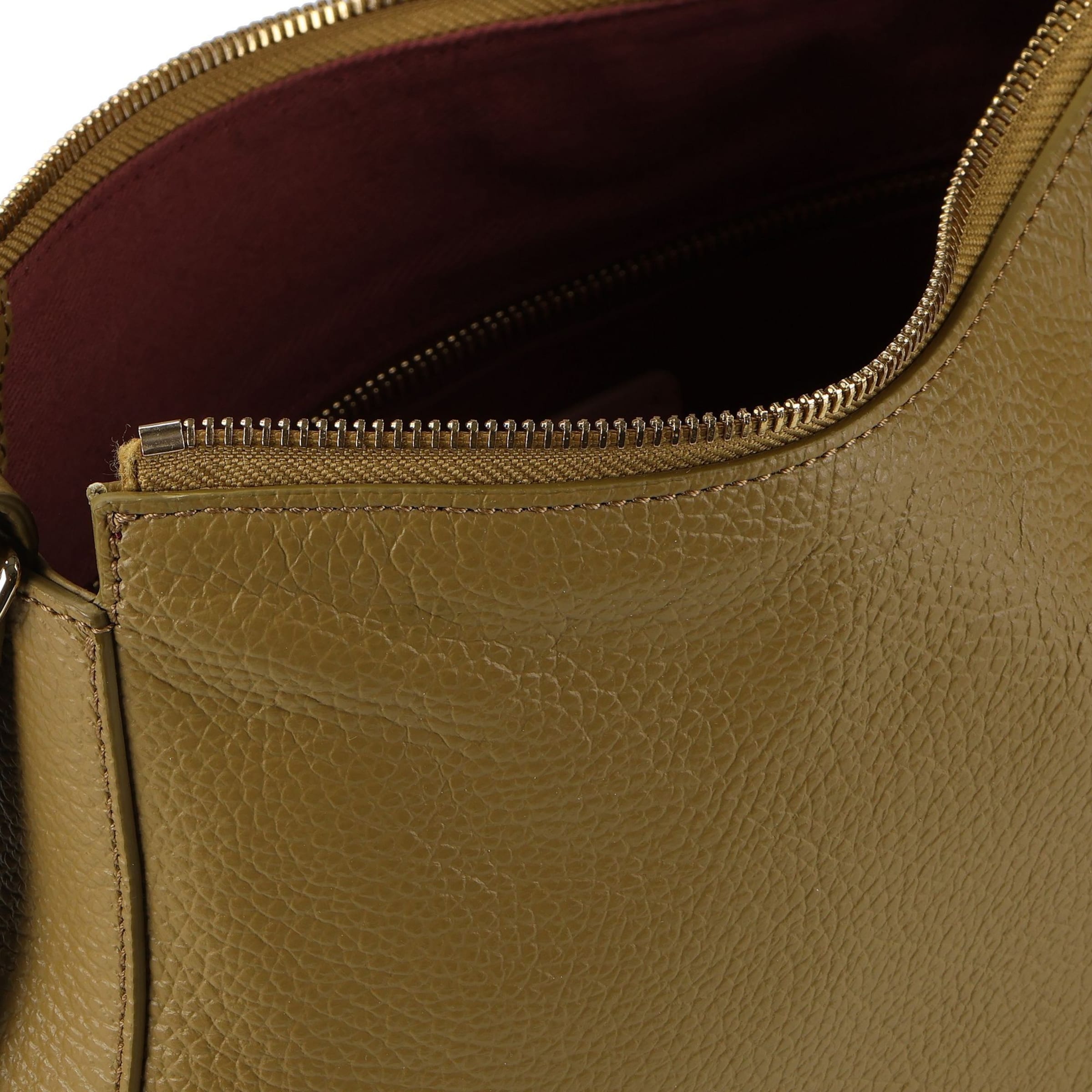 Coccinelle Schoudertas 'Nory' in Groen