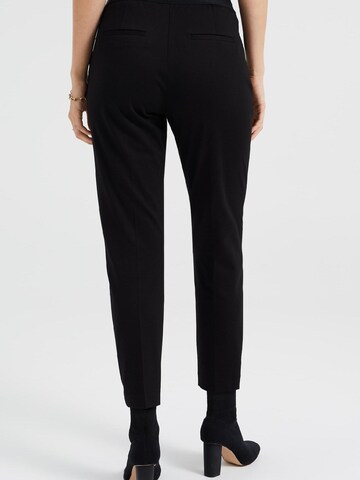 WE Fashion Slimfit Kalhoty s puky – černá