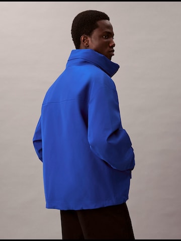 Geacă de primăvară-toamnă de la Calvin Klein pe albastru