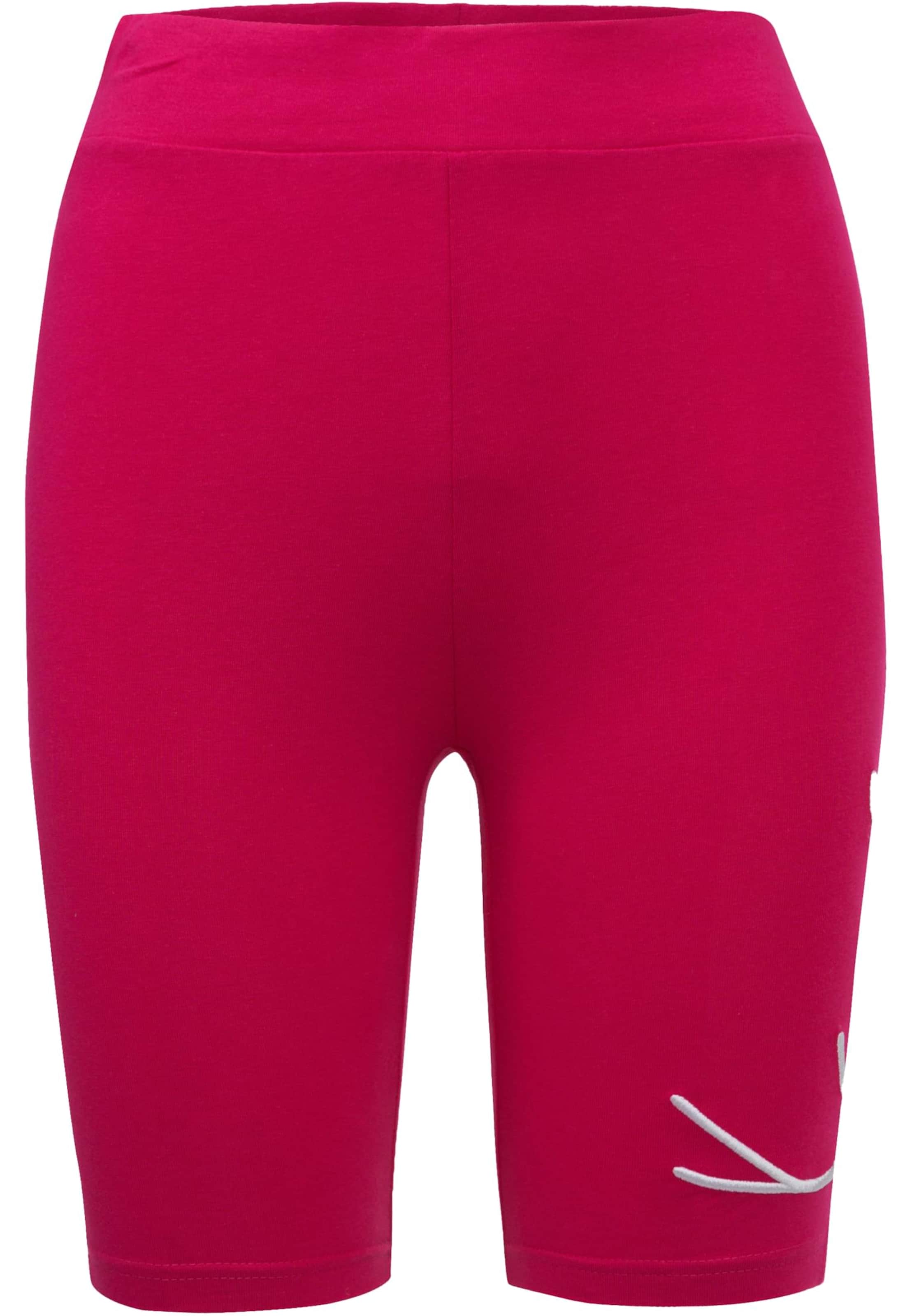 Karl Kani Skinny Sportbroek in Roze: voorkant