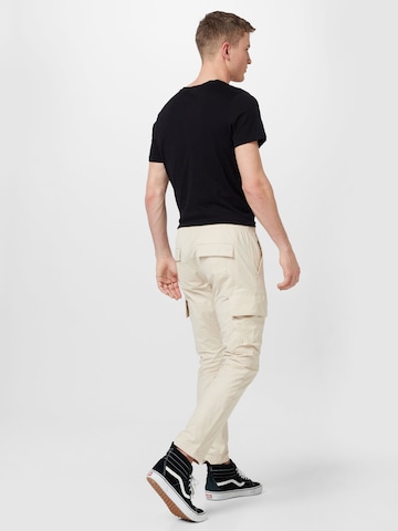 Skinny Pantalon cargo Calvin Klein Jeans en beige