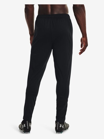 UNDER ARMOUR - Slimfit Calças de desporto em preto