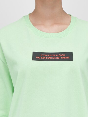 UNFOLLOWED x ABOUT YOU - Camiseta 'HIGH' en verde