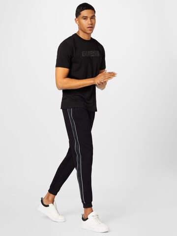 GUESS Tapered Pants 'Mickey' in Black