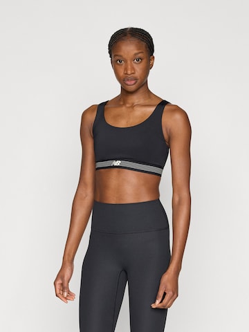 new balance Bustier Sportmelltartók - fekete: elől