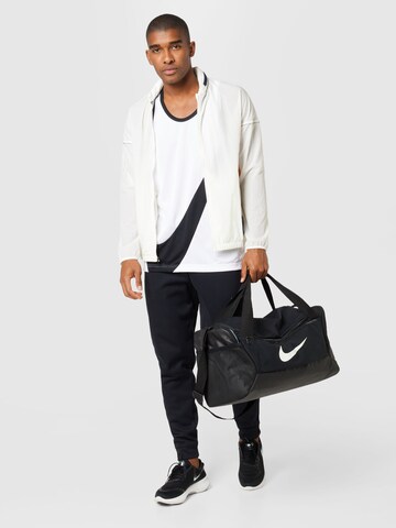 Veste de sport NIKE en blanc