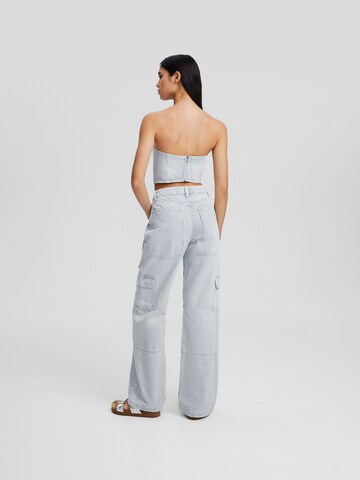 Bershka Loose fit Cargo trousers in Blue