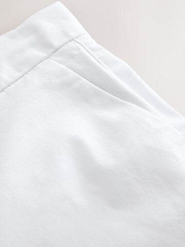 Next Úzky strih Nohavice - Biela