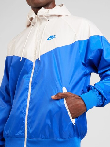 Nike Sportswear Between-season jacket in Blue