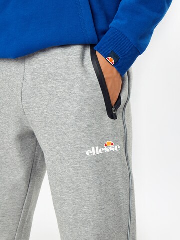 ELLESSE Конический (Tapered) Спортивные штаны 'Diruta' в Серый