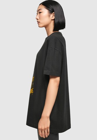 Merchcode Oversized shirt 'Naughty By Nature - Drip Crown' in Zwart