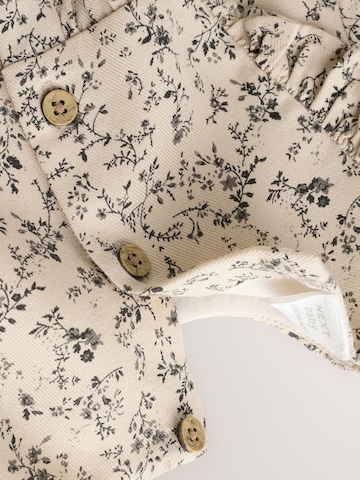 Barboteuse / body Next en beige