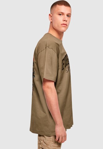 Forgotten Faces T-shirt 'Overgrown Skull' i grön