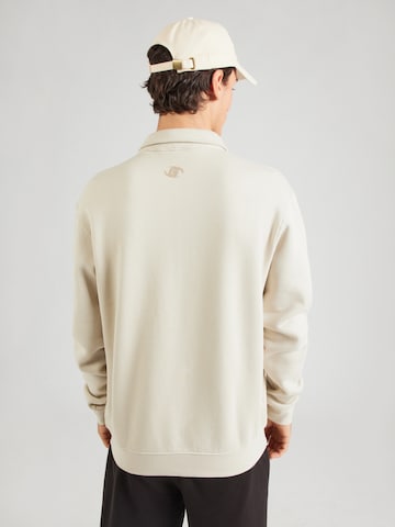 Sweat-shirt 'NICCO' GUESS en marron