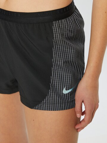 NIKE Regular Workout Pants in Black