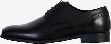 Chaussure basse REDSKINS en noir : devant