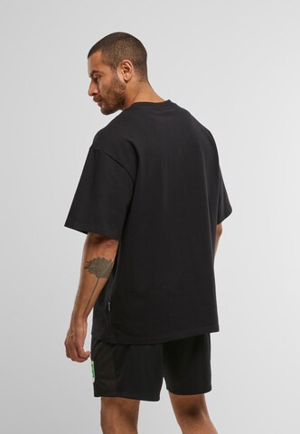 Colucci Bluser & t-shirts 'Ikarus' i sort