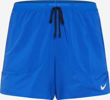 NIKE Sportsbukser 'Stride' i blå: forside
