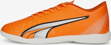 Chaussure de foot PUMA en orange : devant