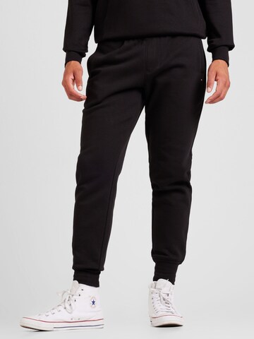 Tuta da jogging di TOMMY HILFIGER in nero