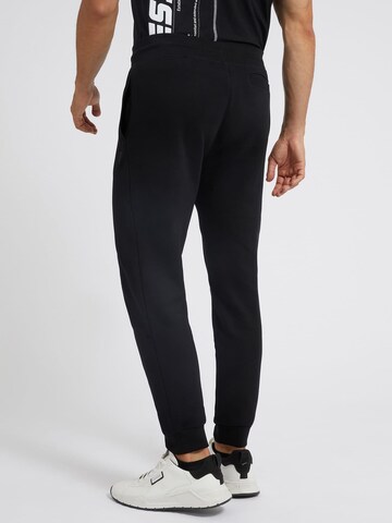 Effilé Pantalon 'ALDWIN' GUESS en noir