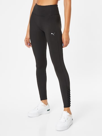 PUMA Skinny Workout Pants in Black: front