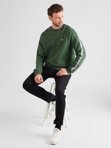 LACOSTE Sweatshirt i grön