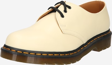 Chaussure à lacets Dr. Martens en beige : devant