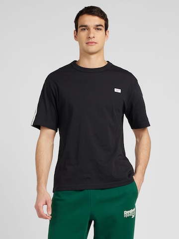 T-Shirt fonctionnel Reebok en noir : devant