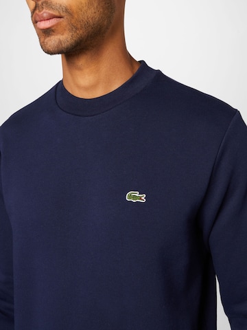 Sweat-shirt LACOSTE en bleu