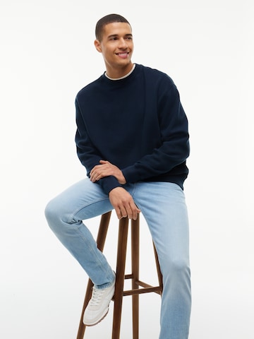 Tommy Jeans Slimfit Jeans 'AUSTIN' in Blauw