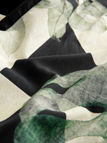 Next Jumpsuit i blandade färger