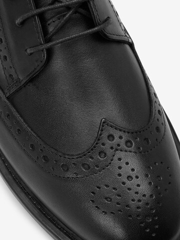 Chaussure à lacets Next en noir