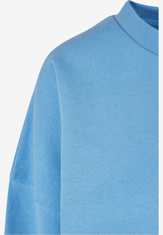 Sweat-shirt Karl Kani en bleu