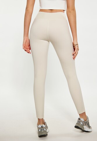 faina Athlsr Skinny Workout Pants in Beige