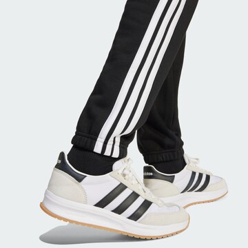 ADIDAS SPORTSWEAR Tapered Παντελόνι φόρμας 'Essentials' σε μαύρο
