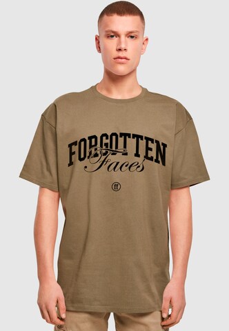 Forgotten Faces T-shirt 'Overgrown Skull' i grön: framsida