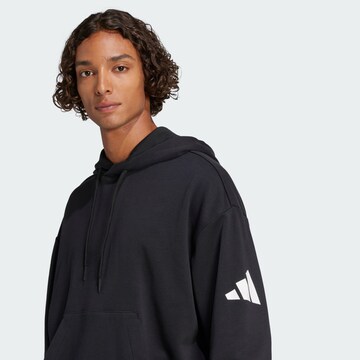 ADIDAS SPORTSWEAR Sports sweatshirt 'Essentials' in Black