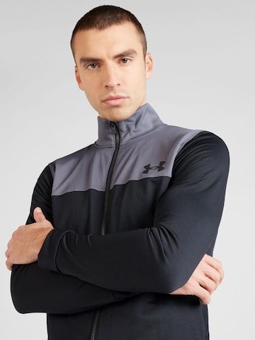 UNDER ARMOUR Trainingspak 'EMEA' in Zwart