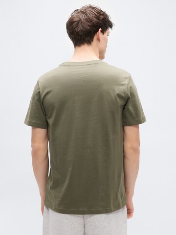 PUMA Functioneel shirt 'Essentials No.1' in Groen