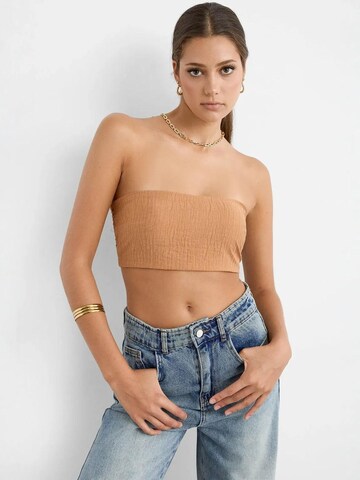 Top di Hiccup in marrone: frontale