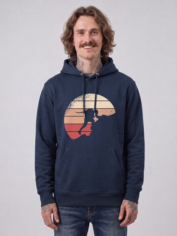 Felpa ' Mountain Climbing ' di Watapparel in blu: frontale