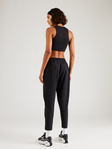 regular Pantaloni sportivi 'ACTIV COLL SKYSTRETCH' di Reebok in nero